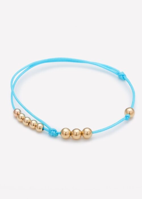 MISHA TURQUOISE STRING BRACELET